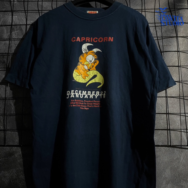 Kaos T-Shirt Second Kartun Garfield Capricorn Zodiac Copyright 1978