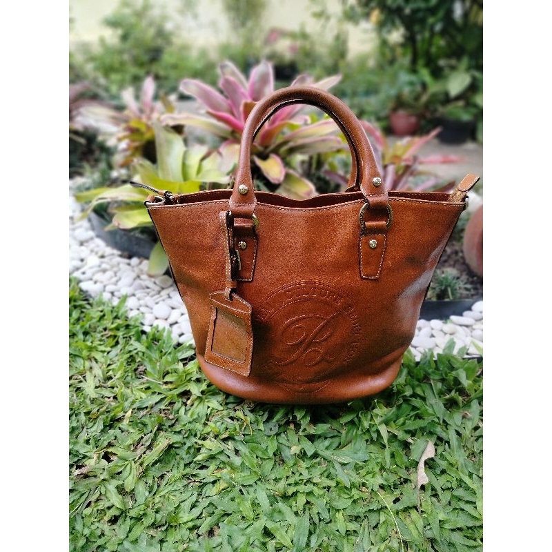 Tas kulit asli brand Bequem original warna coklat, hand/sling bag (koleksi pribadi)