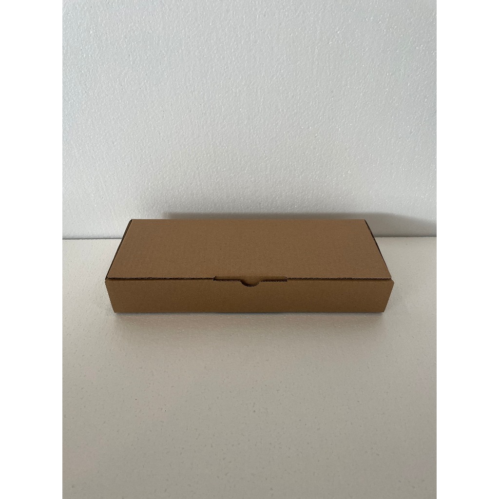 

Kardus Box Packing 32 x 12 x 5cm - Diecut Single Wall 32x12x5cm Dus Packing