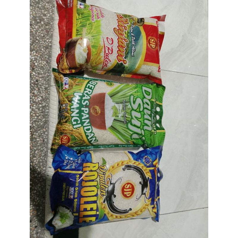 

beras kemasan 2,7 kg / 3 kg merk rojo lele , rinjani , daun suji