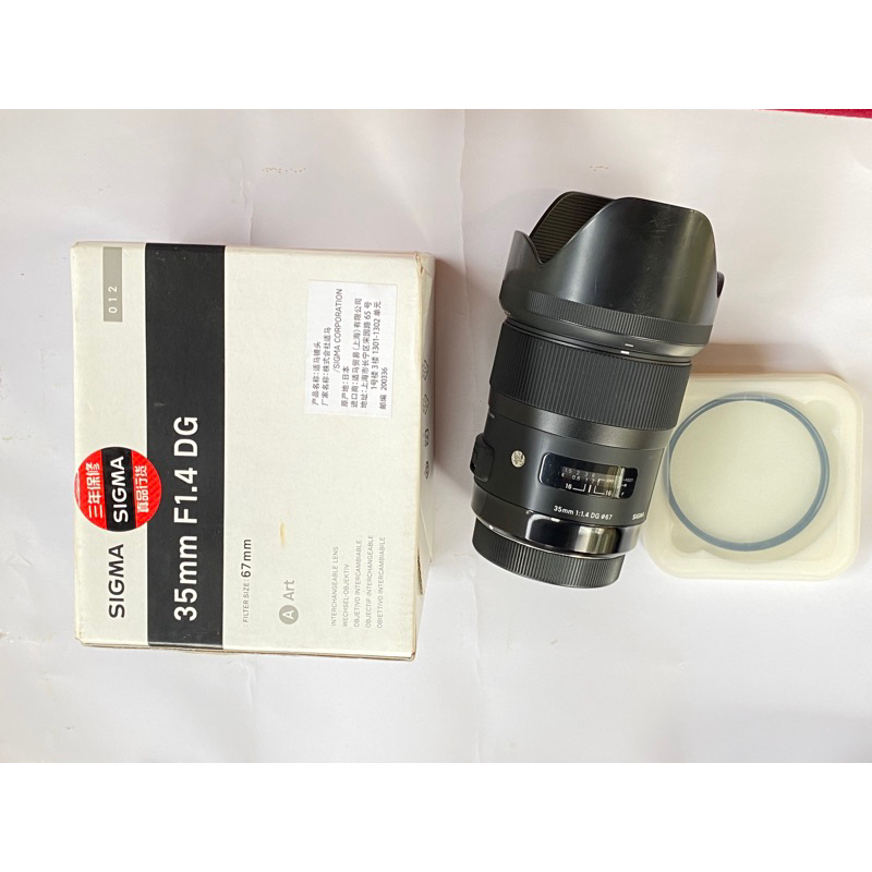 lensa sigma art 35mm f1.4 DG for canon (second like new)