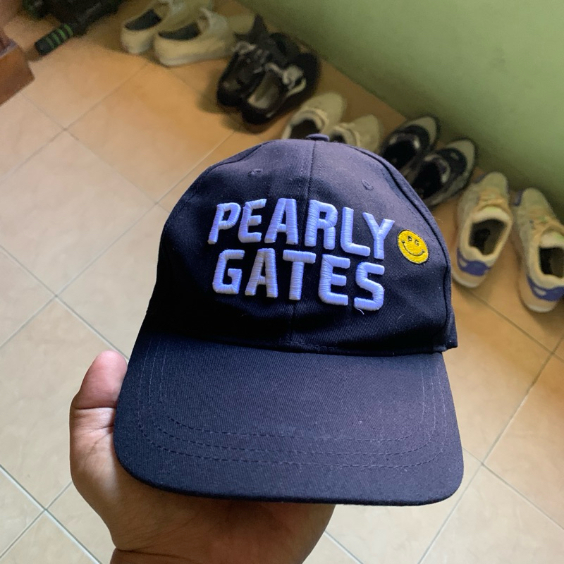 Topi Pearly Gates