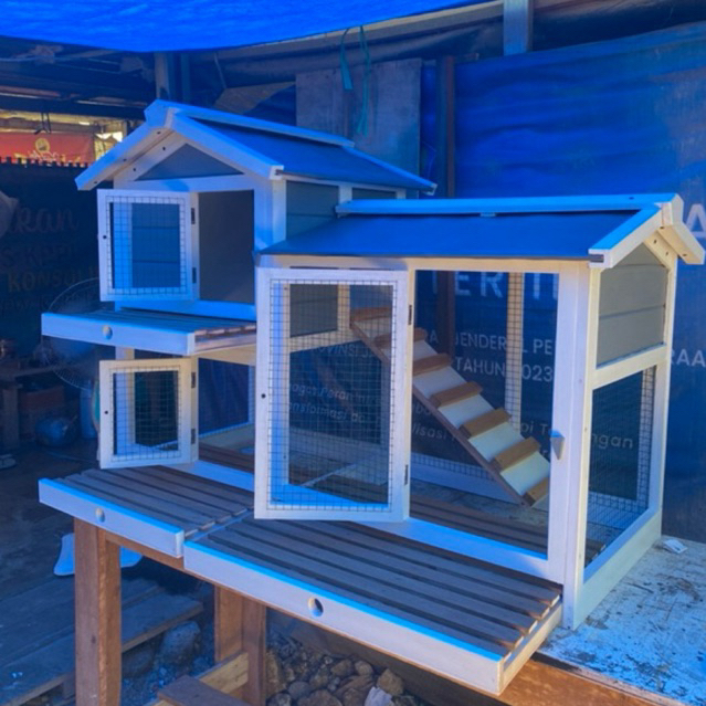 kandang kelinci tingkat alas kotoran