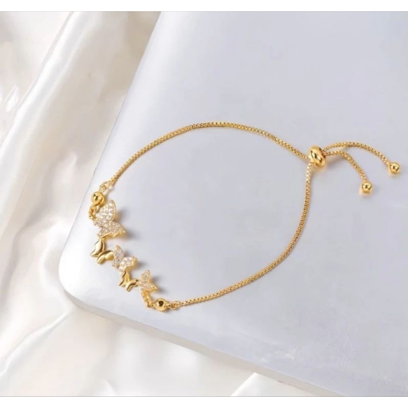 gelang tangan xuping serut kupu permata