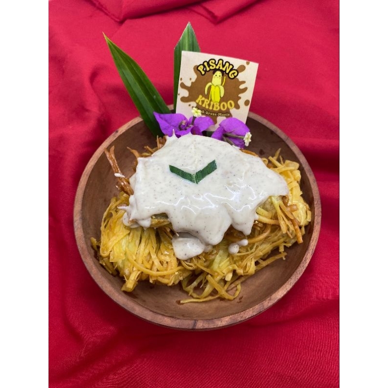 

Pisang Kribo toping tiramisu kemasan lunch box