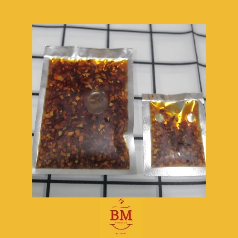 

Chili Oil Pedas Gurih kemasan pouch 7-9gr