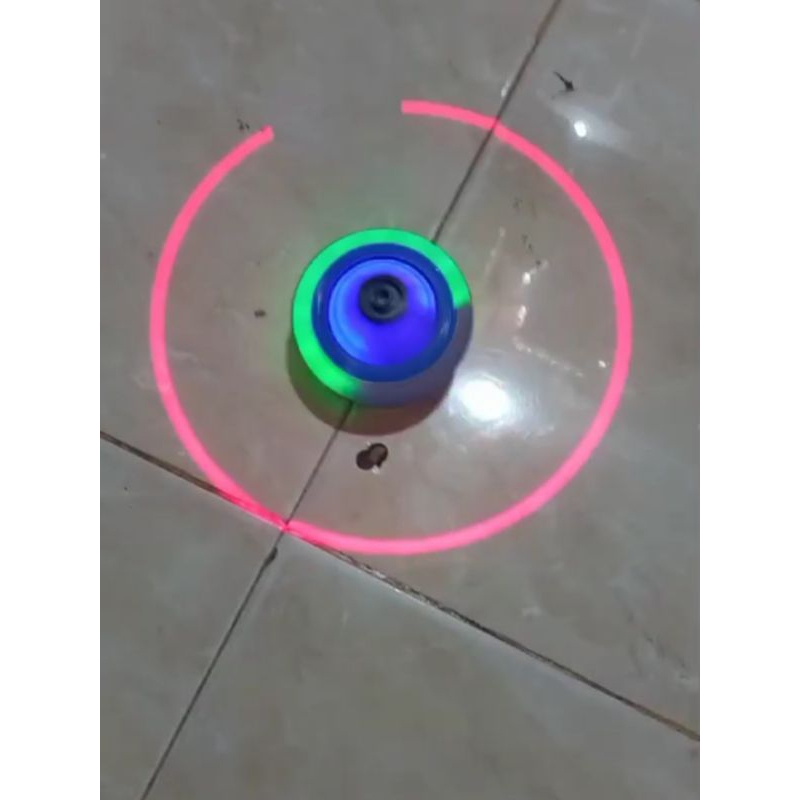mainan gangsing musik dan lampu laser