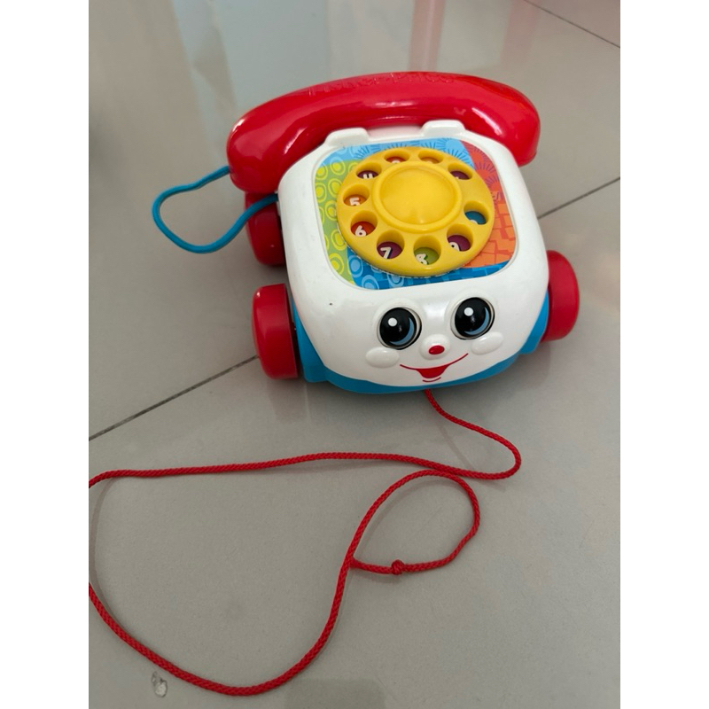 Preloved fisher price chatter phone pull along toy