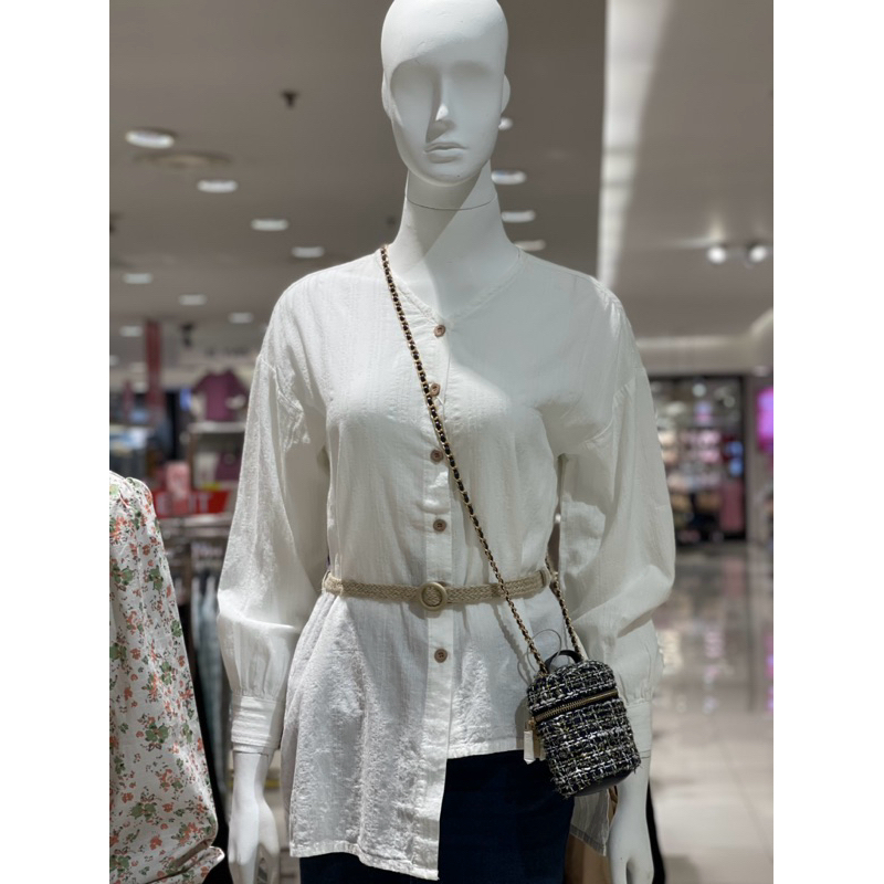 blus putih wanita Exit