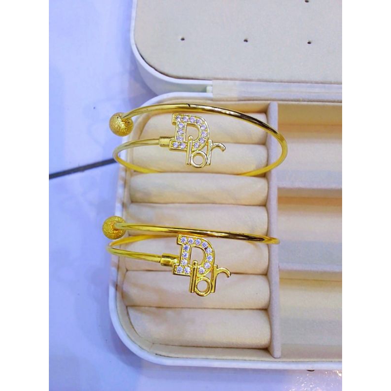gelang logam dior