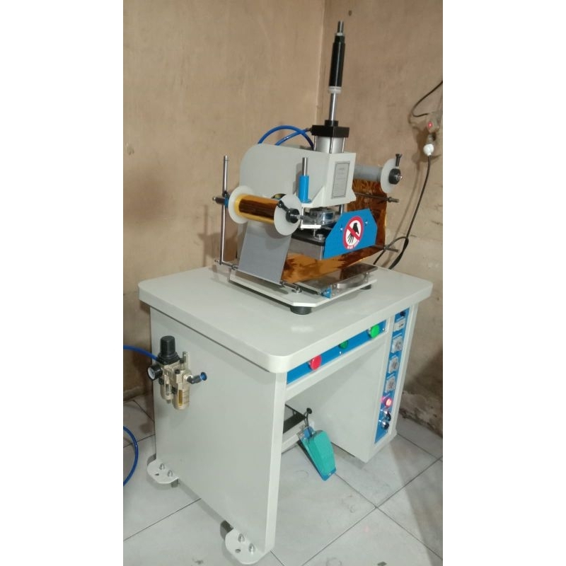 

mesin hotprint emboss stamping foil automatis