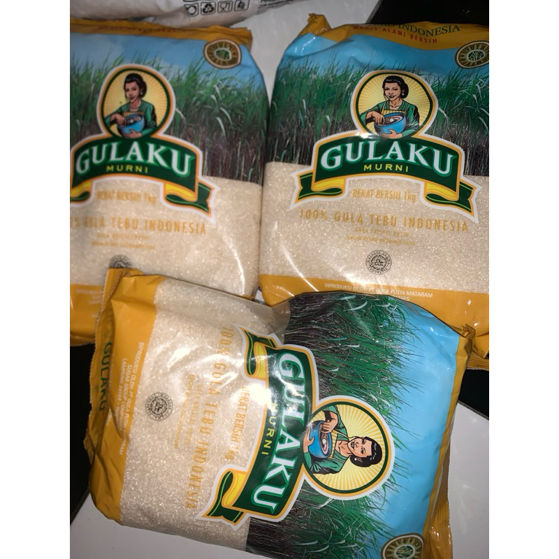 

Gula kemasan 1kg GULAKU kuning