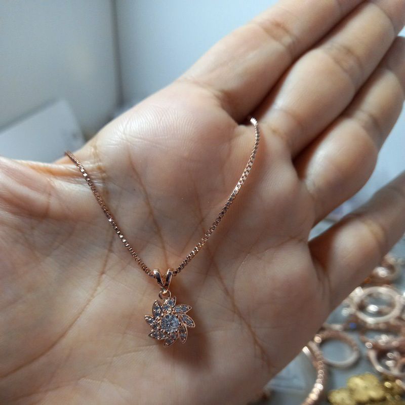 Kalung Liontin Putar