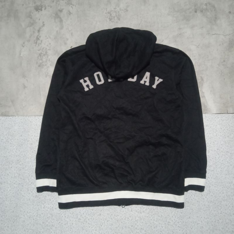 jaket coach varsity holiday hitam bekas