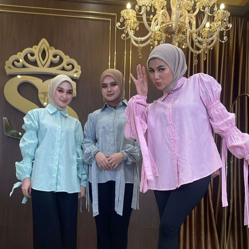 kemeja pita shellasaukia