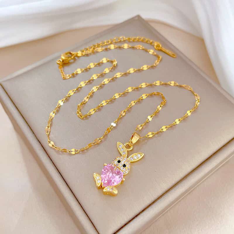 Kalung Titanium Motif Boneka Pink