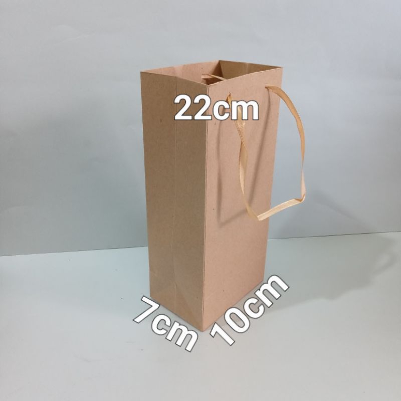 

paperbag polos panjang ukuran(10×7×22)cm isi 12 pcs/pack