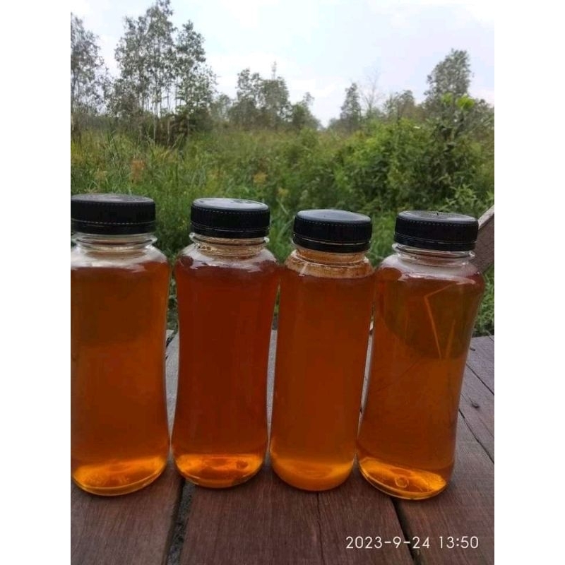

madu asli dari lebah, isi kurang lebih 250 ml