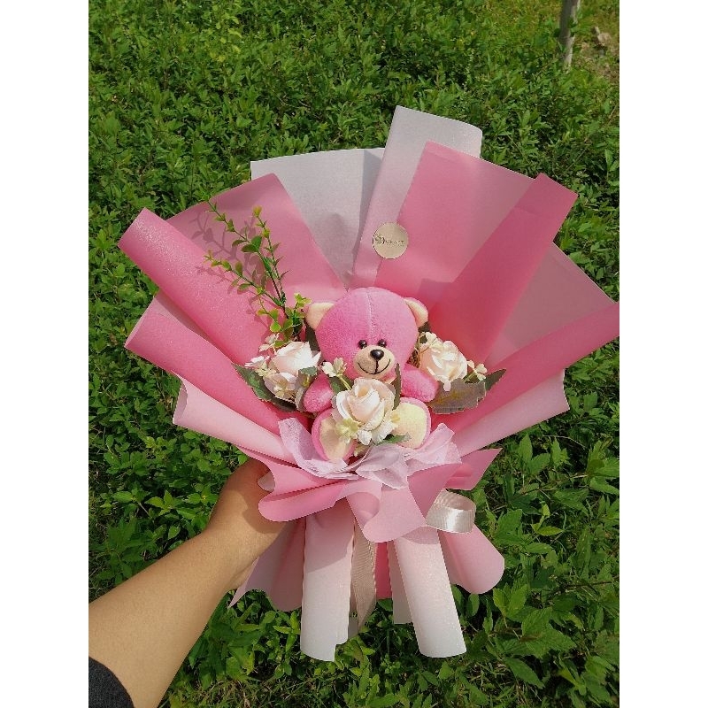 

BUKET BONEKA MIX BUNGA