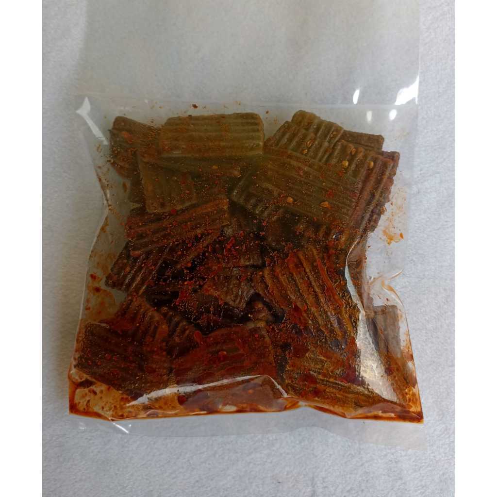 

SEBLAK KERUPUK JENGKOL PEDAS SARI DAUN JERUK KEMASAN 250 gr