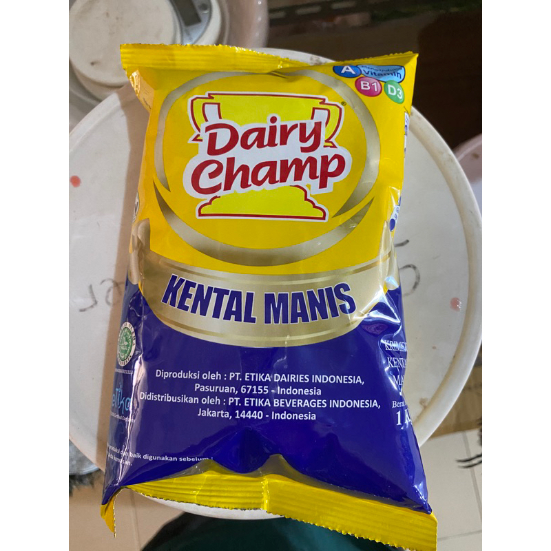 

Susu Kental Manis Dairy Champ Refill 1kg