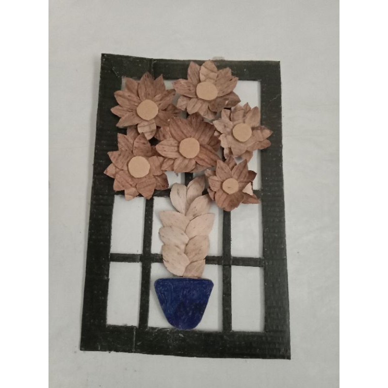 Hiasan dinding dari daun pisang yg sudah kering