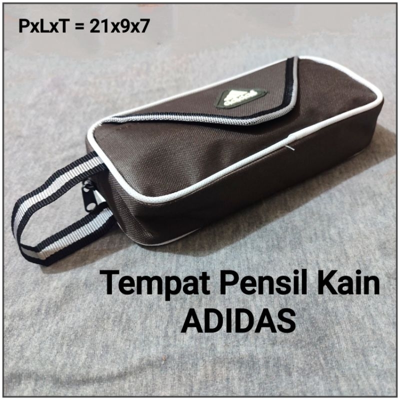 

Tempat Pensil Kain Resleting ( Warna Random )