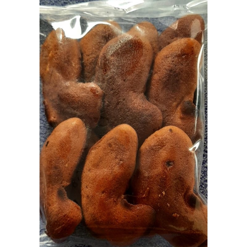 

Kue Bolu ikan rasa gula enau berat lebih kurang 150 gram