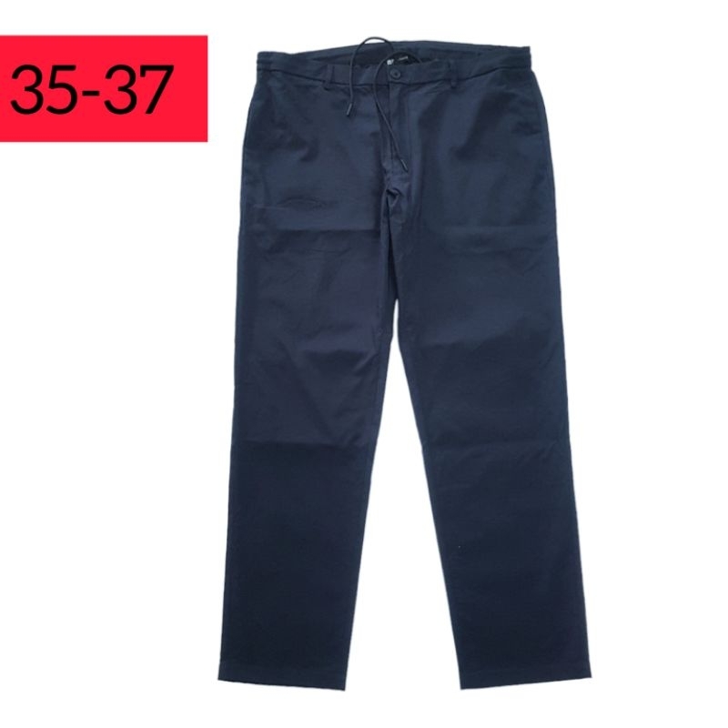 Celana panjang rileks UNIQLO X THEORY ( size XL )