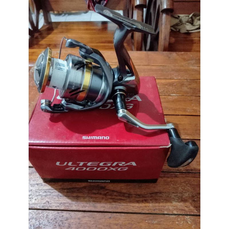 reel shimano ultegra 4000xg dan penn conflict II 2000 bekas