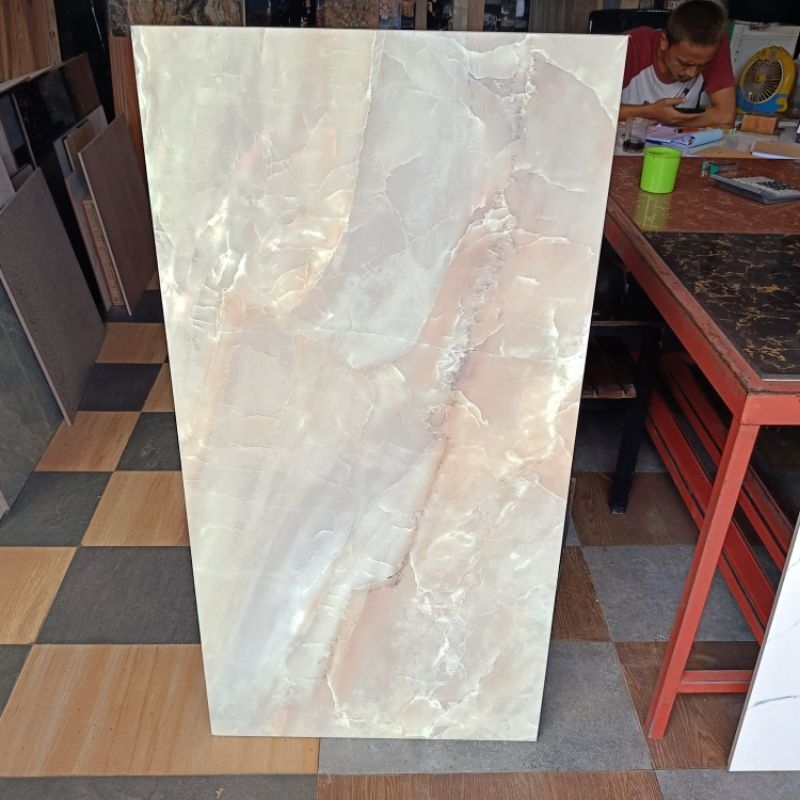 granit lantai uk 60x120 motip marmer brown