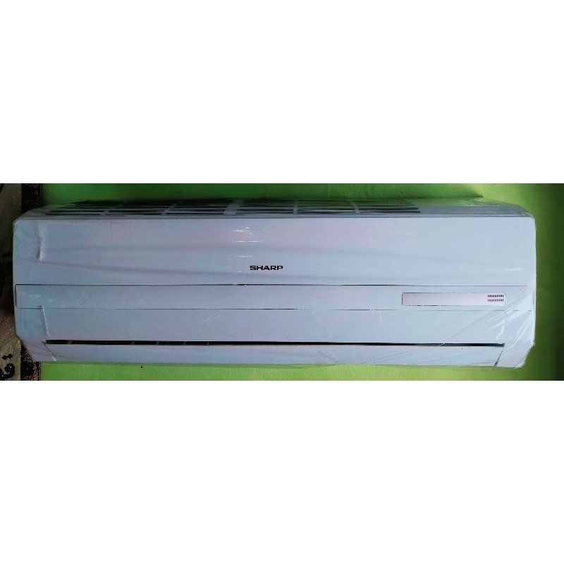 KIPAS AC ukuran 1 pk merk SHARP.pakai REMOT .mode sudah pakai mode SALJU