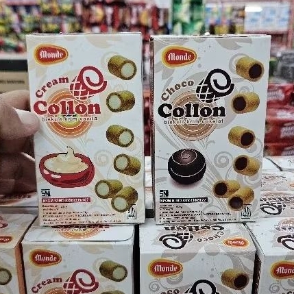 

ED 06.25 - PCS 40GR - MONDE COLLON RASA COKLAT - VANILA / BISKUIT COLON