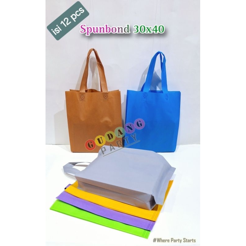

Spunbond Press 30x40 Tas Goodie Bag Handle Serbaguna Tas Bingkisan