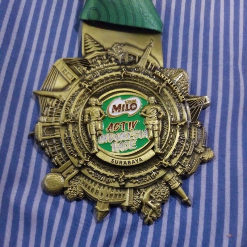 MEDALI GOLD MILO 50 TAHUN ACTIV INDONESIA RACE