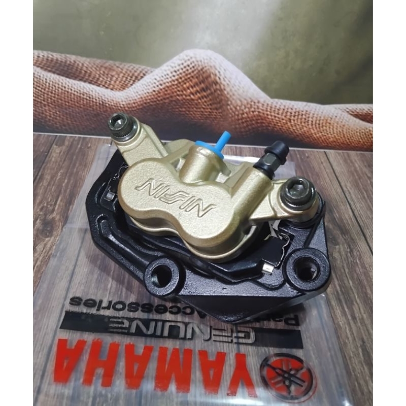 kaliper cakram assy depan/kaliper pala babi rem depan (LOGO NISSIN) plus kampas rem YAMAHA FIZ