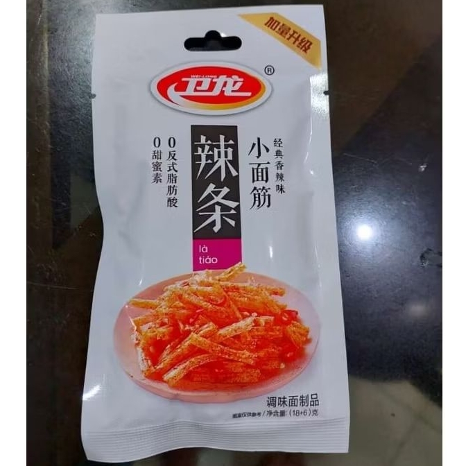 

Snack Cina Pedas Wei Long La Tiao Spicy 24gr