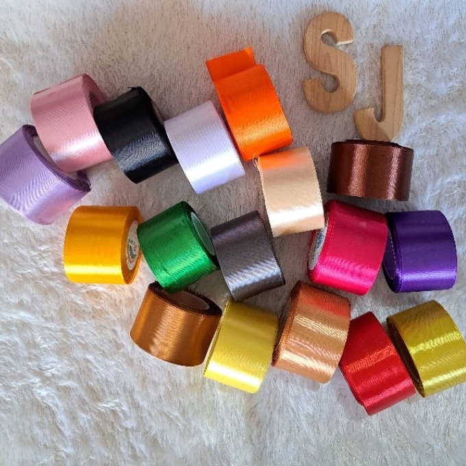 

HJ6 Pita Kain Saten Lebar 5cm Panjang 25mtr