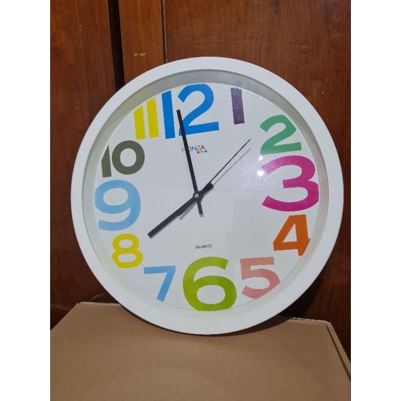 jam dinding monza / jam dinding pelangi / jam dinding putih putih / jam dinding makassar / jam dindi