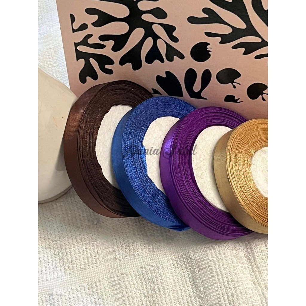 

PITA SATIN 1,5 CM PER ROLL 20 YARD BERBAGAI WARNA