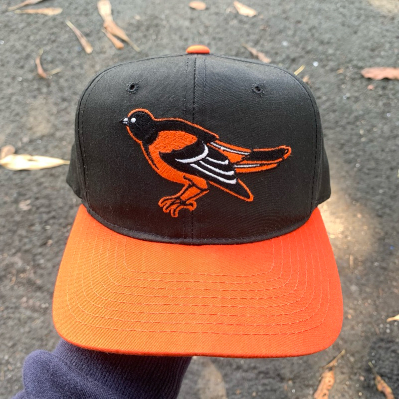 TOPI - SNAPBACK VTG NE PROMODEL ORIOLES - BACA DESKRIPSI