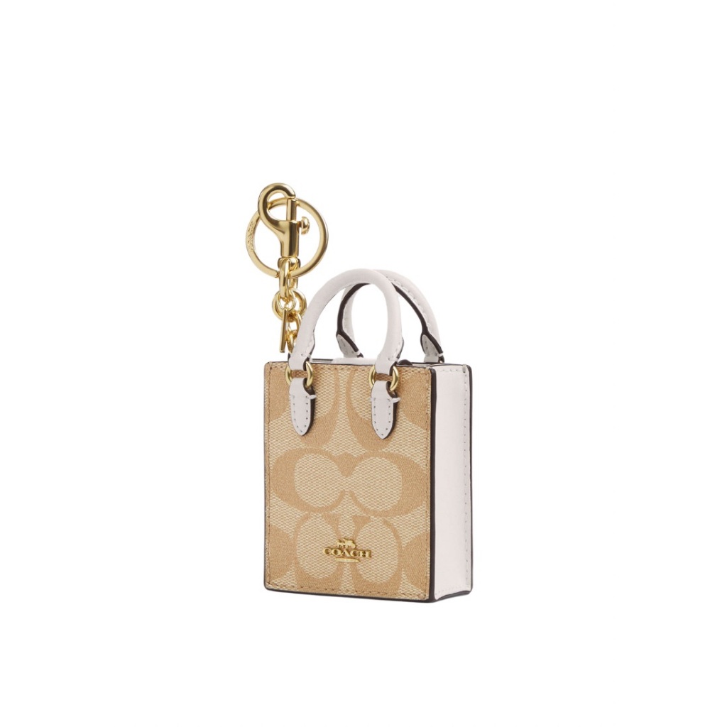 COACH North/South Mini Tote Bag Charm In Signature Canvas Light Khaki Chalk