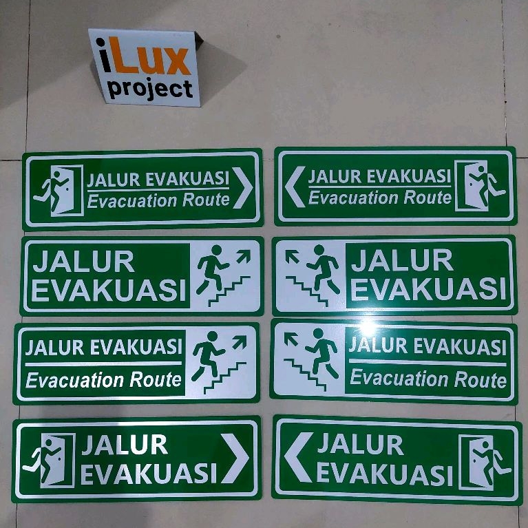 

Sign Jalur Evakuasi Akrilik Dua Bahasa 30x10cm Reflekrif Memantulkan Cahaya Nyala Saat Terkena Lampu