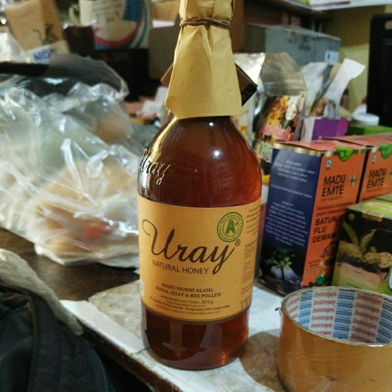 

MADU URAY NATURAL HONEY BERAT BERSIH 875 GRAM PT. REJEKI TUJUH ALAM