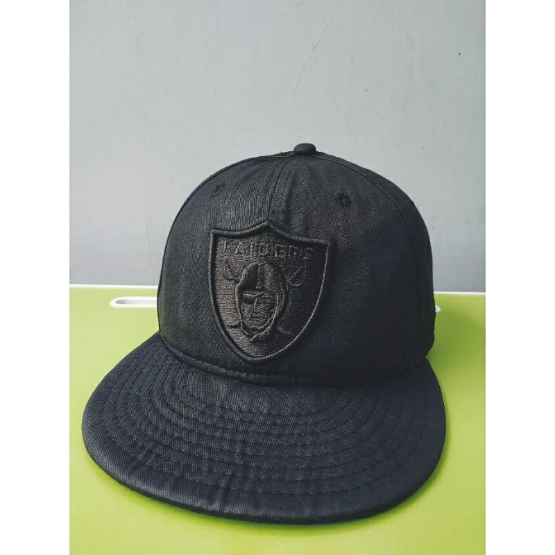 topi new era raider