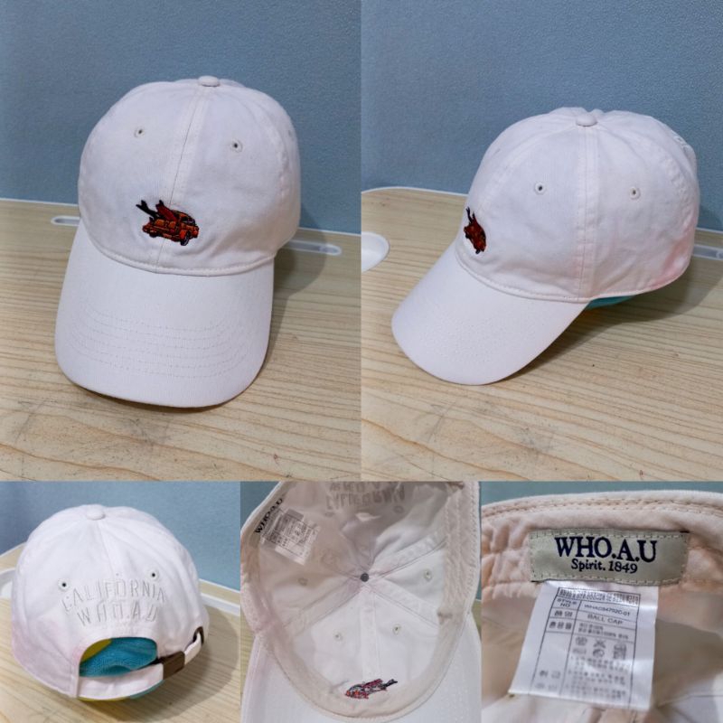 Topi Putih keren brand WHO