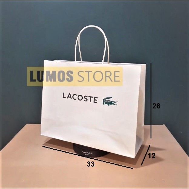 

Paper bag Lacoste landscape putih 2 sisi