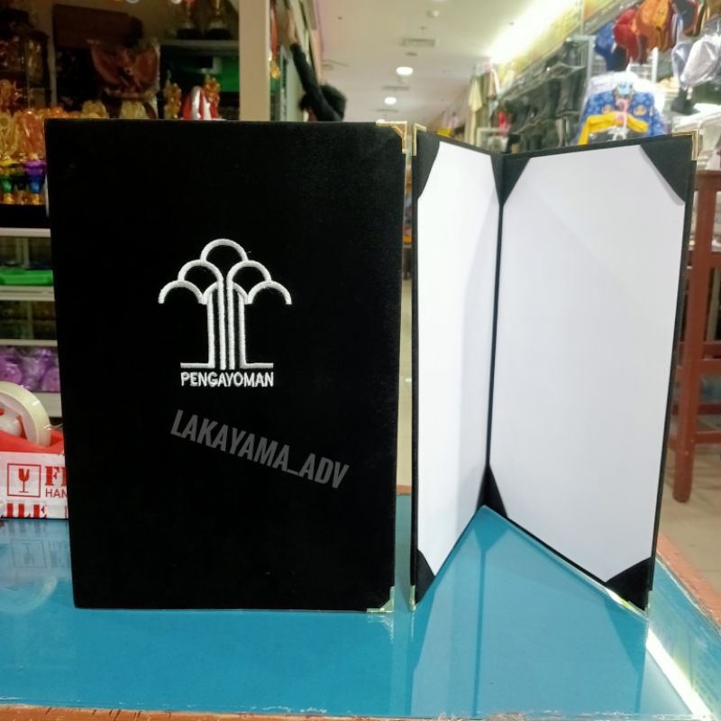 

map beludru logo pengayoman dengan logo proses bordir komputer