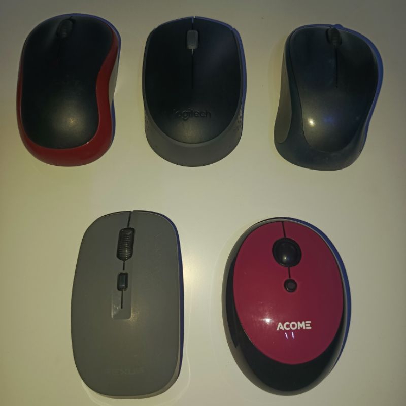 dongle Logitech plus mouse Logitech wireless bekas layak pakai normal dan ada merk lain