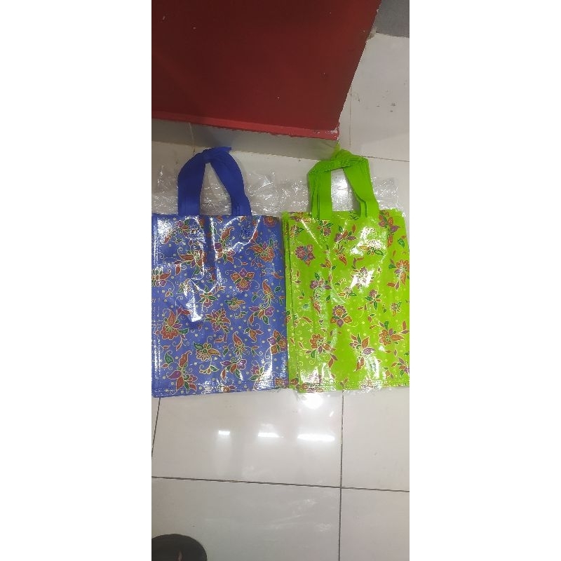 

tas spunbond laminating new bunga isi 12 pcs(30*40)